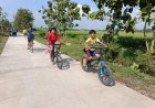 Jalan Baru TMMD di Desa Puro Diserbu Anak-Anak, Jadi Arena Sepeda dan Olahraga Favorit Warga